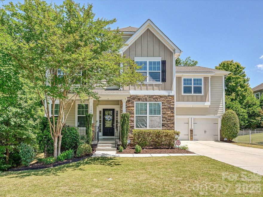 Welcome to 1104 Snowbird Lane, a stunning 5-bedroom retreat tucked away on a private, wooded lot in the highly sought-after Lawson neighborhood! From the moment you arrive, the picturesque curb appeal sets the stage for what’s inside. Enter through the front door into an expansive, light-filled open floor plan boasting beautifully updated new flooring throughout both the main and upper levels. The main floor is designed for effortless living and entertaining, featuring an elegant formal dining room, a dedicated home office with custom built-ins, and a spacious family room anchored by a cozy stone fireplace. The heart of the home is the massive chef’s kitchen, fully equipped with an oversized island, premium stainless steel appliances, granite countertops, a gas cooktop, a large breakfast area, and a seamless drop zone. A rare main-level bedroom adds incredible flexibility that can be used as a bedroom or flex space. Upstairs, the primary suite serves as a private sanctuary, complete with its own cozy fireplace, a relaxing sitting area, and a spa-like ensuite bath. Three additional generously sized bedrooms and a convenient Jack-and-Jill bathroom round out the upper level. Your outdoor oasis awaits! Off the kitchen, a beautiful screened-in porch flows effortlessly onto two additional tiers of expansive decking—ideal for seasonal entertaining or just soaking in the peaceful views of your lush, private, wooded backyard. All of this is situated in a premier community offering resort-style amenities, including multiple pools, waterslides, clubhouse, fitness centers, playgrounds, tennis and pickleball courts and walking trails. Don’t miss the chance to call this Lawson gem home yours!