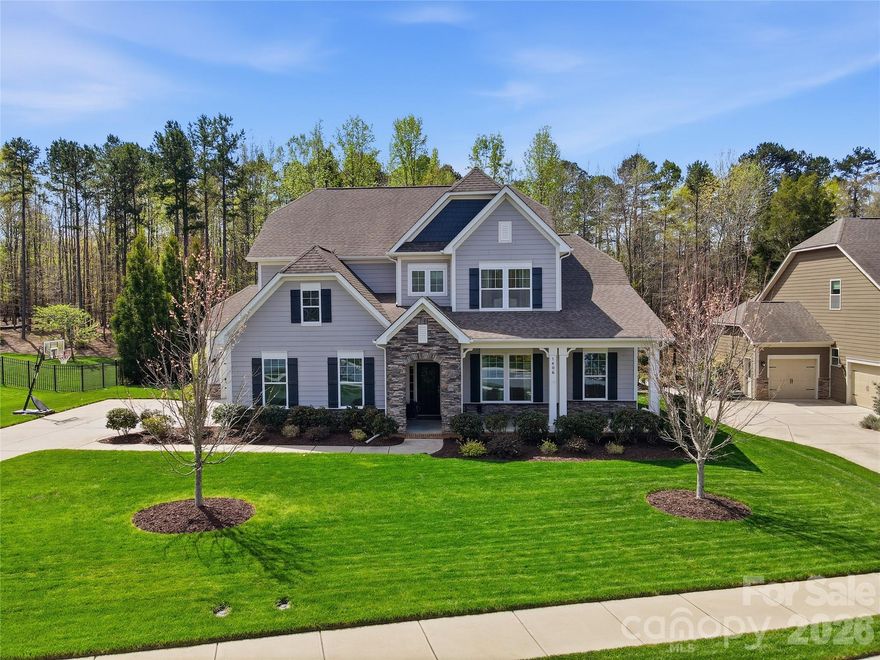 Welcome to this beautiful Bonterra-built Montebello model all nestled in the sought after Adelaide Estates neighborhood. An absolute unicorn with a primary suite on the main level and the upscale finishes today’s buyers crave. From the moment you step inside, the soaring 10-foot ceilings and 8-foot doors set the tone for a home designed with exceptional attention to detail. The main level offers a seamless blend of style and function. The kitchen is a standout, featuring well-appointed finishes, quartz counters, generous cabinetry, and a pantry spacious enough to stock with ease. A thoughtfully designed drop zone and a beautifully finished laundry room add everyday convenience. The great room flows effortlessly, creating an inviting space for both entertaining and quiet evenings at home. The primary suite is a true retreat, highlighted by a charming bay window and a spa-inspired bath with a large shower, soaking tub, and dual sinks. The walk-in closet is designed with organization in mind, offering ample storage and smart layout. Upstairs, you’ll find four additional bedrooms (bedroom/bonus) and two full bathrooms, giving everyone room to spread out. Whether you need guest space, a home office, or a bonus area, the flexibility here is unmatched. Outdoor living shines with a covered patio featuring paver-stone flooring, perfect for relaxing evenings or weekend gatherings. The fully fenced yard backs to a tree-lined backdrop, offering privacy and a peaceful setting that truly makes the yard pop. Additional highlights include a three-car garage, hardwood floors, Pottery Barn-inspired style throughout, and the quality craftsmanship Bonterra is known for. This home blends elegance, comfort, and functionality in a way that’s hard to find—and even harder to forget. This home is topped off by being in the top rated Weddington school district. A must-see for buyers seeking something special.