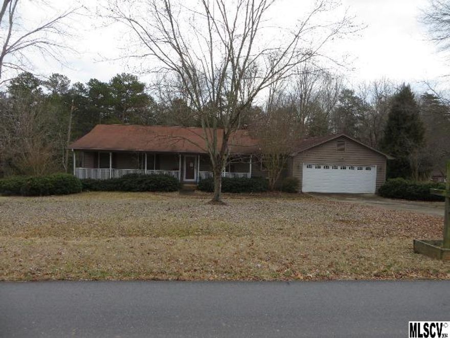 Over 1400 Sq Ft of living area conveniently located just east of Lincolnton, Family room w/vaulted ceiling, fireplace and door leading to large rear deck, good size dining area, kitchen offers plenty of cabinets & eat at bar, nice size bedrooms, 2 car garage, storage building and large covered front porch all on over an acre.  Convenient location with easy commute to Charlotte.