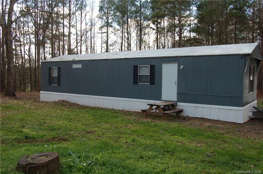 Affordable living on approx. 3 acres in the McConnells area of York County.  Fenced paddock can be used for horse.  Small mobile home has new whirlpool bath. Well pump, bladder and lines replace August 2015.  Roof was re-sealed Aug 2015