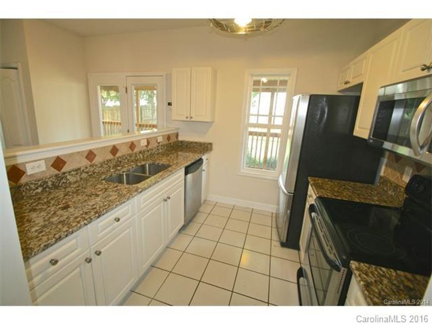 This is a must see 3 bedroom 2.5 bath single family Home.  laminate and tile downstairs. Stailness steel appliances. Granite counter tops. Fenced in back yard with a  screened in back porch.  Come view this open floor plan that is available January 16, 2017.  please be mindful of tenants.