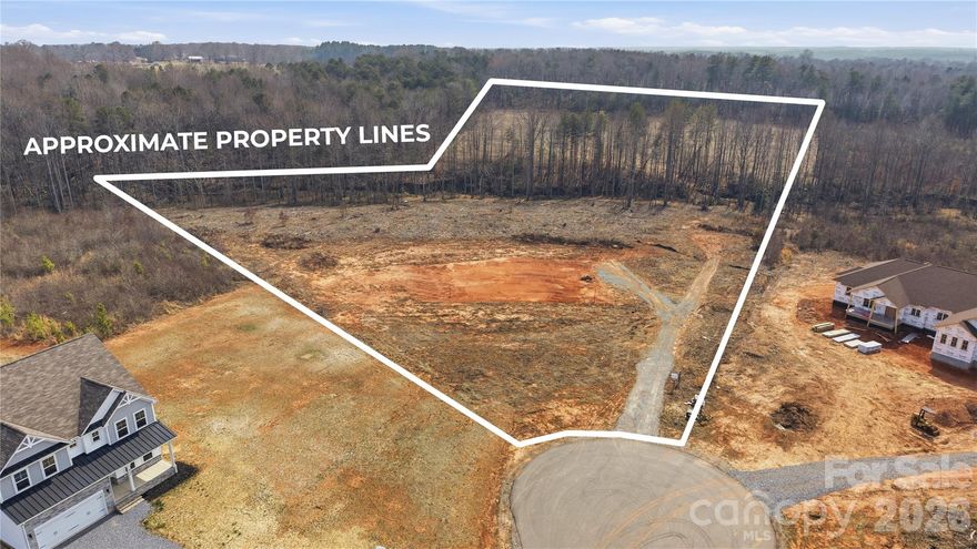 11.63 Acres in Western Lincolnton, NC. 
Exceptional 11.63-acre estate lot in desirable McCurry Farms neighborhood offering a rare combination of usability, privacy, and long-term flexibility. 
A large, level cleared homesite sits at the front of the property ideal for your primary residence and outdoor living space. A small natural creek runs through the tract, creating a beautiful natural separation between the flat build area and the gently rolling wooded acreage beyond.
The property has been professionally mulched and is highly walkable, making it easy to visualize the placement of a custom home, detached structures, gardens, pasture, or additional improvements. Whether you're planning a private estate, homestead, equestrian setup, or thoughtfully designed family compound, the topography supports a wide variety of uses.

 McCurry Farms is a newer subdivision in western  Lincoln County known for larger homesites and quality construction.  Convenient to downtown Lincolnton, NC Highway 27, and US Highway 321 with an easy commute to Charlotte.  Close to the local library and Westwinds Park while still offering the privacy and serenity of a true country setting. Less than 1 mile to West Lincoln MS & HS.
Bring your builder and create something lasting.