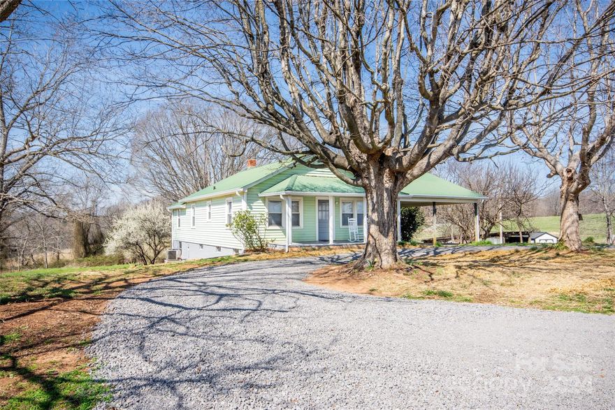 Completely remodeled Farmhouse on over 2 acres adjoining farmland! This amazing one level home with basement offers a fully renovated main level with original hardwood floors that have been beautifully handcrafted and refinished, wide molding, all new appliances and cabinetry in the spacious kitchen, new full bath and added half bath. Laundry closet added to main level for convenience! Oversized 2 car carport, new HVAC, & septic! New hookup to county water! Situated perfectly at a dead end road for added privacy. Location is ideal being close to town and easy access to interstates but with a quiet country feel. Short deeded easement off state maintained Lundy Rd. This was all one large farm before and the poultry houses you will see are uninhabited and not suited for poultry at this time. A real gem and the perfect farmhouse with just enough acreage to have a small mini farm with a garden or a few pets! One level living at its best! Absolutely adorable property!