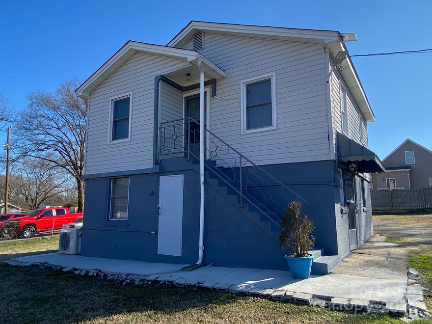 Location! Location! Location!!  Recently Remodeled and painted throughout, updated kitchen, lots of tile, Newer full bath, two bedrooms  which you can control the heat and cool temperature in each room separately for individual comfort. Convenient to Everything, Gas Station, Grocery store & restaurants two blocks away, Tons of shopping less than a couple miles, Walk to Downtown McAdenville (Christmas Towne USA), A very short drive to downtown Cramerton, 15 Mins to Charlotte Airport, 20 mins to Downtown Charlotte, 20 mis to White Water Center. Water and Trash Service Included. NO PETS ALLOWED! Upper level home.