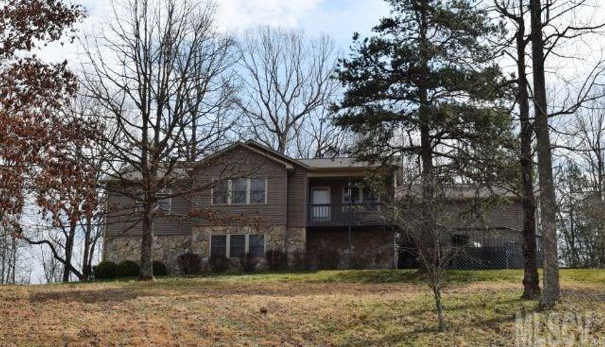 Over 10 acres of rolling fields, creek on the left side of the property. Drive over a branch to view this gorgeous hilltop home with a full basement. Beautiful 3BR/2BA Ranch with custom oak cabinets, large kitchen island, pantry with plenty of storage. Formal dining room over looking the private front yard with an extensive porch and small fish pond. Hardwoods floors throughout the main living areas, wood burning fireplace. Large bedrooms, master with a private bathroom.  Sun-room addition with an  electric fireplace is a great place to enjoy your evenings. 24x30 Pole Barn. Updates include: NEW HVAC, roof, hardwood floors, water heater. Well maintain property! Great buy - to view property on GPS you will need to pull up : 6235 W NC 10 HWY