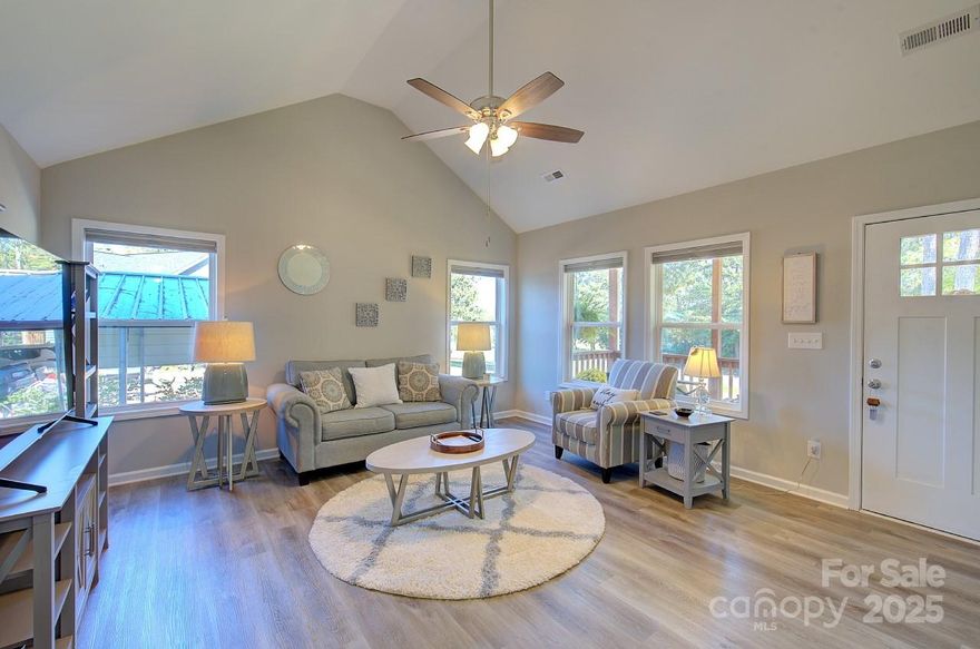 Price improvement! Nestled on a quiet, tree-lined street, this charming 3 bed, 2 bath home in charming Hickory Grove community offers a harmonious blend of comfort, style, and privacy. Enjoy your morning coffee on the welcoming rocking-chair front porch, adding a touch of classic southern charm. Come on inside to find an inviting, light-filled interior with beautiful flooring throughout. The eat-in kitchen is a chef’s delight, featuring granite countertops, stainless steel appliances, and a spacious pantry. Down the hall, you’ll find a convenient laundry room and ample storage. The Owner’s Ensuite provides a serene retreat, complete with a spacious closet, dual vanities, and granite countertops. Two additional, spacious bedrooms offer versatility for, guests, or a home office. Outside, a partially fenced backyard awaits, featuring a covered deck perfect for outdoor gatherings, a storage shed, and a 2-car carport. USDA 100% financing available. Seller is motivated, let's make a deal!