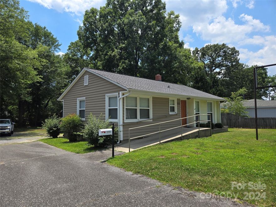 Cute as can be is this home that can be used as residential or commercial office space.  Updates in the last 7 years include, new windows, paint, flooring, water and sewer lines under the home, water heater, vinyl siding with styrofoam backing, attic insulation, LED lighting in every room, updated kitchen with new appliances, HVAC replaced in 2017 with all new ductwork as well, roof was replaced 2022.  Has storage shed with recent metal roof added. Large tree lined backyard with lots of parking availability.  Easement/shared driveway. Feel free to do any and all inspections, however, house is sold as is, where is..