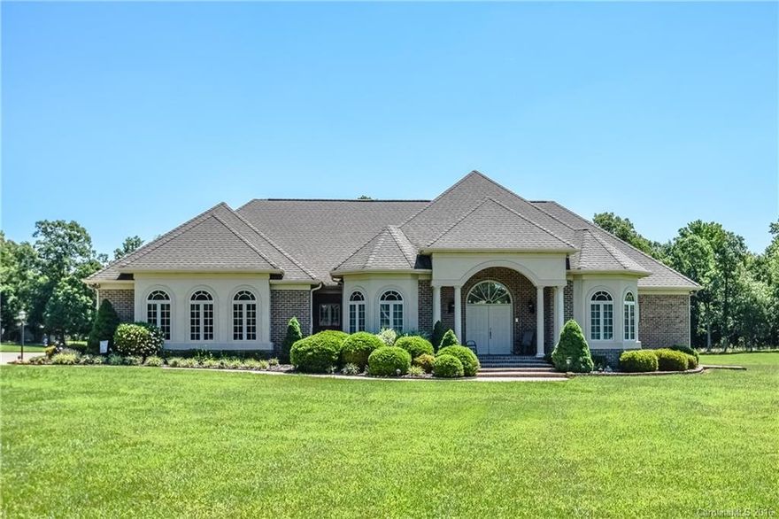 Beautiful custom built home maintained in immaculate condition!!!! Air conditioned and heated over sized attached garage/workshop. Tons of upgrades including, granite counters in kitchen, new carpet throughout, new paint and much more! Gorgeous hardwoods in dining and foyer. Handicap accessible. Breathtaking view from the over sized covered patio area. Large front and back yard with lush landscaping. Full concrete driveway. Be sure to click on film reel to view virtual tour!