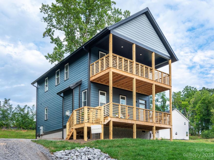 Experience the epitome of modern living in this brand-new 3-bedroom, 2.5-bathroom home located in the sought-after south Asheville area. This exquisite residence strikes the perfect balance between luxury and affordability. High-end finishes adorn every corner, showcasing the meticulous craftsmanship that went into creating this home. Upstairs, you'll find three spacious bedrooms, offering ample space for family and guests. The primary bedroom is a true retreat, complete with an adjoining porch that provides stunning views. The location of this home is equally impressive, with easy access to local amenities, shopping, dining, and entertainment options. This home offers a unique opportunity to own a high-end property at an affordable price point. Don't miss the chance to make this dream home yours. Contact us today for a private showing and experience the allure of south Asheville living for yourself.