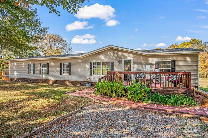 **Charming 3-Bedroom Retreat on 2 Acres in Rockwell, NC**

Discover your ideal sanctuary in this expansive 3-bedroom, 2-bathroom manufactured home, perfectly situated on over 2 acres of picturesque open land in the serene town of Rockwell, North Carolina. This property seamlessly blends rustic allure with modern convenience, offering you the best of both worlds—peaceful country living just moments away from local dining, shopping, and parks.

As you go inside, you'll appreciate the spacious layout that provides ample room for relaxation and entertainment. 

Outside, the expansive backyard yields endless possibilities. A well-equipped workshop, complete with power hookup, is perfect for hobbyists or those looking to host memorable backyard gatherings.

Sellers motivated. Open to offers.

No city taxes. No HOA.