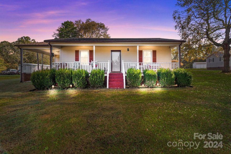 Welcome to this delightful 2-bedroom, 1-bathroom home, perfectly situated on just over half an acre in a peaceful residential area. As you step inside, you'll appreciate the open floor plan that seamlessly connects the kitchen and living room, creating a spacious and inviting atmosphere. Recent updates make this home truly shine, featuring brand-new flooring throughout, an updated bathroom, and fresh paint that enhances its modern appeal. The kitchen boasts a new electric range, and the refrigerator is included for your convenience.

A cozy indoor laundry/mudroom adds functionality, while the single carport provides ample parking space. Enjoy serene outdoor living on the back deck, overlooking a large backyard complete with a storage shed. Additional highlights include gutter guards on the back gutters and a roof that is approximately 7 years old.

Conveniently located near I-85 and Highway 74, this home offers an easy commute to larger surrounding cities.