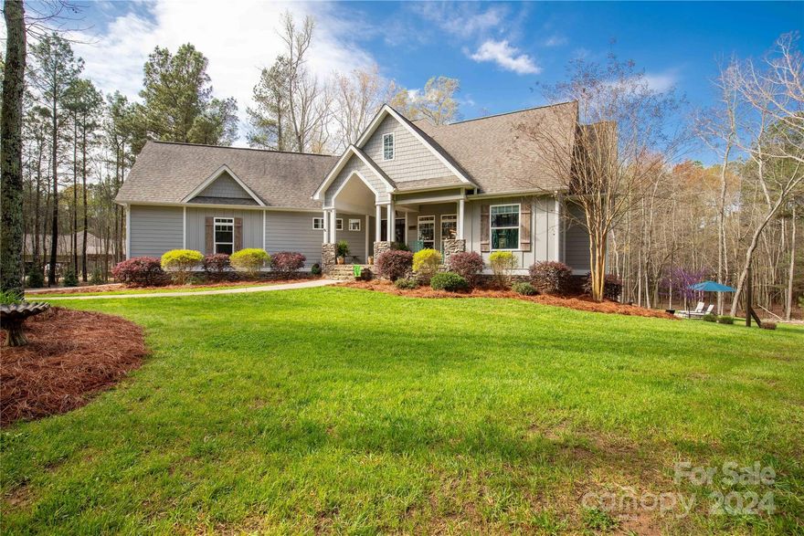 Welcome HOME to this beautiful custom-built home nestled on 6.68 acres of privacy and serenity. Walking in the front door will WOW you! The custom features throughout include coffered ceilings in the dining area and living room, crown molding, built-ins galore, and custom rustic wood accents on the entry ceiling and office wall. This home exudes charm and luxury! The kitchen showcases SS appliances, a farmhouse island sink, custom white cabinets, and granite tops. The primary suite is simply stunning with its shiplap accented tray ceiling, and rustic barn door entry into the impressive en-suite bath. The outdoor living spaces take your breath, with multiple covered porches overlooking your backyard oasis of an inground pool. But wait! There's More! The full basement is wired, plumbed, with ductwork in place, and ready for you to add the finishing touches for an additional 2100 sq ft of living space! This one truly offers it all!