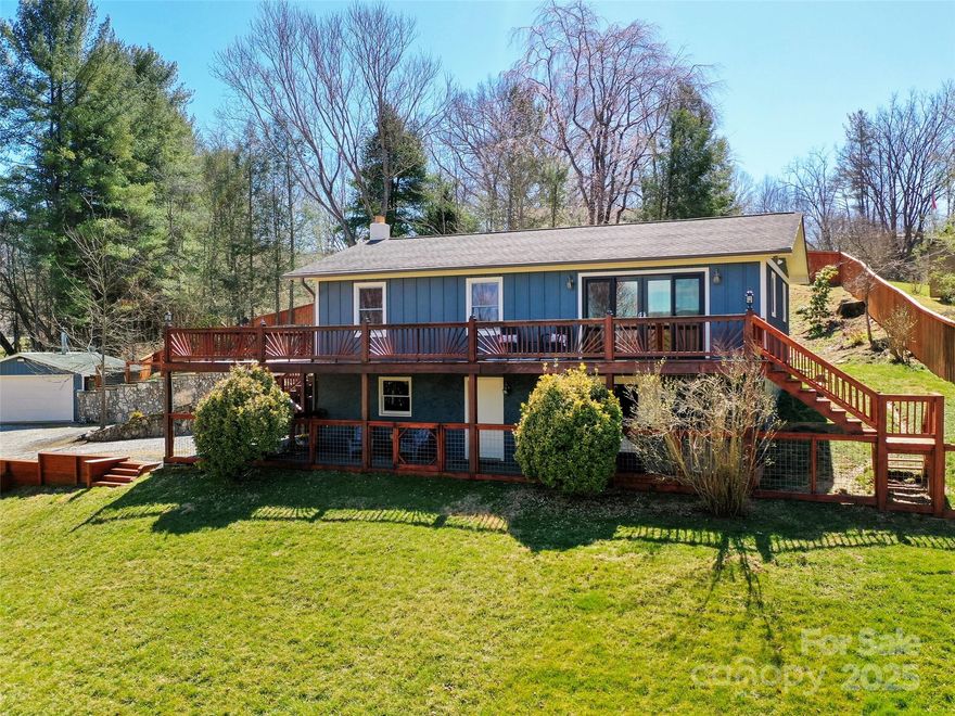 This gorgeous home offers the perfect blend of space, serenity, and functionality. With panoramic mountain views that will take your breath away, you'll feel like you're living in your own private retreat. The expansive layout includes a full basement featuring a dedicated workshop, exercise room, laundry area, with walk out access to enjoy your hot tub after a long day. The open floor plan allows for seamless indoor-outdoor living, with a large wrap-around deck ideal for enjoying the surrounding nature and fresh air. The generous backyard is fully fenced, offering both privacy and space for outdoor activities, gardening, or entertaining. As an added bonus, this property includes a spacious 1022 sq ft metal building heated with wood stove, providing endless possibilities for a studio, additional workspace, or even a hobbyist's dream. Whether you're seeking peaceful solitude, room for hobbies, or a place to host friends and family, this home has it all.