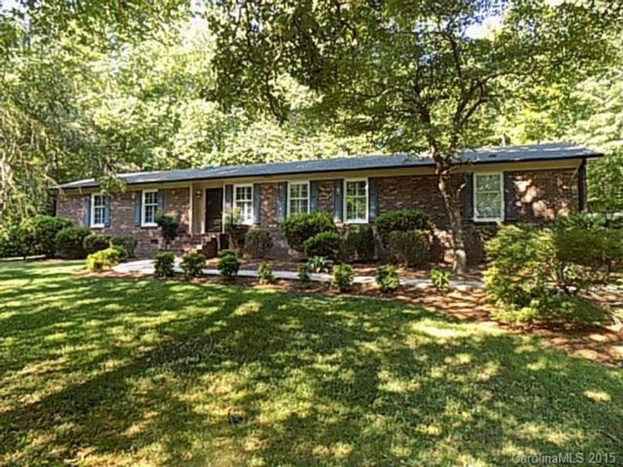 Two car attached garage,16x20 screened porch 12x16 rear deck, Detached 26x20 workshop with utility room. Upgrades thur out  New cherry kitchen cabinets with granite counter tops and silgranit sink.Updated bath rooms have Kohler cast iron tubs and fixtures with porcelain tile surrounds and granite counter tops .Vaulted ceiling in den. Secluded 2.87 acre lot with large creek, lots of privacy and mature flowing trees and shrubs. One owner home No city taxs