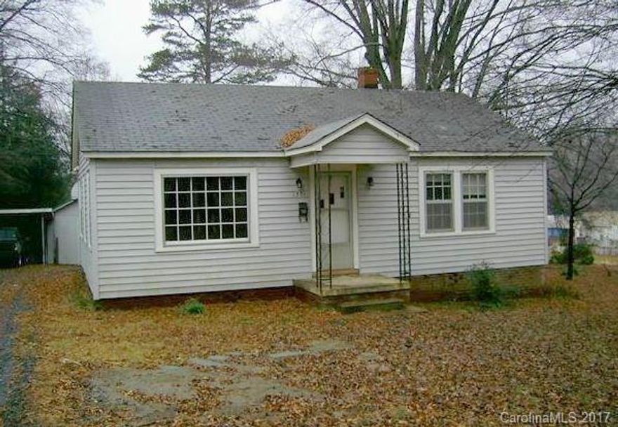 Great ranch home in Kannapolis! Homes features detached carport with shop attached for additional storage, home has great yard space in the back for gardening or extra storage space!