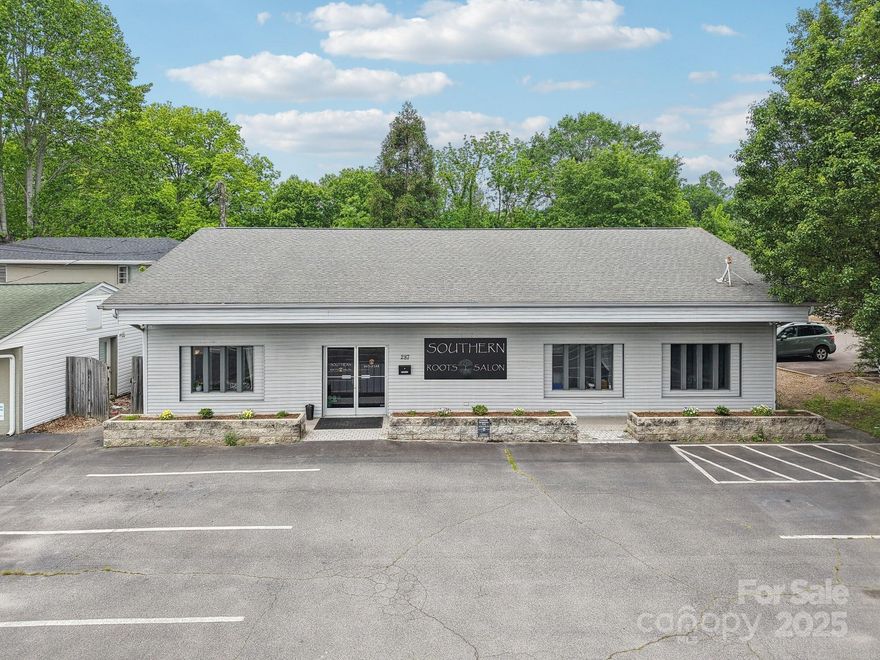 An exceptional opportunity to own a premier piece of commercial real estate approx three blocks from Main Street in the vibrant and charming town of Brevard, North Carolina. This well-maintained 2,500+ sq ft building features 10 dedicated parking spaces—a rare and valuable asset in this sought-after location.

Currently operating as a salon, the property offers a flexible layout suitable for a variety of business uses, whether you choose to continue the current use or customize the space to suit your own vision. High visibility, walkability, and close proximity to downtown shops, dining, and attractions make this an ideal investment for entrepreneurs and investors alike.

With limited commercial properties in Brevard offering this combination of size, location, and parking, this opportunity is truly one-of-a-kind.