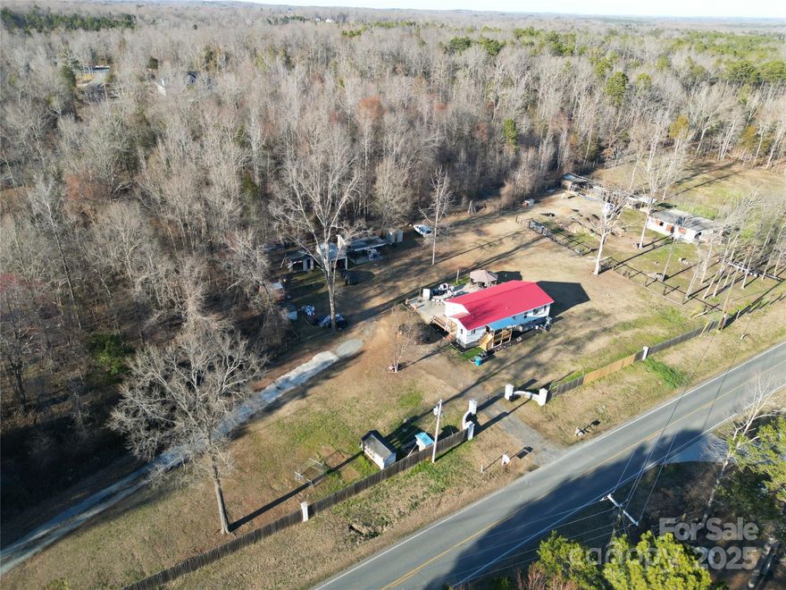 Embrace peaceful country living with endless potential! This 1,240 sq. ft. home on 3 acres has been recently remodeled and offers room for your personal touch. It includes a 200 sq. ft. second living quarter, ideal for an office or future studio apartment. The home features a newer kitchen with stainless steel appliances, granite countertops, and an updated bath with a glass and tile shower. Originally full brick, the exterior now has a modern hard stucco finish.

Enjoy the freedom of rural living—bring your horses, farm animals, or explore Airbnb income potential. The property has well and septic, with city water available (tap fee required) and possible subdivision into two additional 1-acre lots. Whether you want to build, invest, or enjoy the space, this property offers limitless opportunities. Some finishing touches may be needed—come make it your own! Professional photos coming soon!
