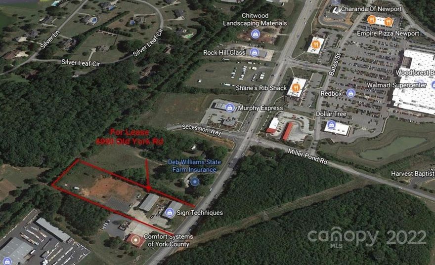 Location, location, location!!! Located across from new Walmart on Hwy 160.  Adjacent to new Aldi, near Rock Hill airport, and convenient to shopping and dining. Brick fronts.  Two 5000 S.F. buildings for commercial, office/warehouse, light industrial use.  Each has office space and 2 bathrooms, entire space heated and cooled. Fully rented with NNN leases.