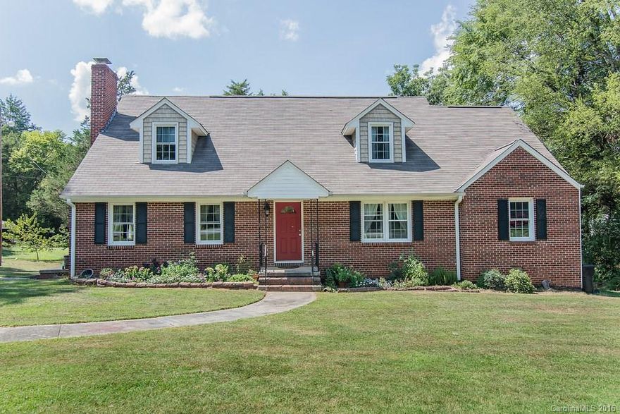 Adorable home with lots of charm and tons of room! This 6 bedroom 3 bath home boasts original wood floors through most of the home, a full mother in law/ teenager apartment in the basement, spacious bedrooms and access to the community pond in the back yard!