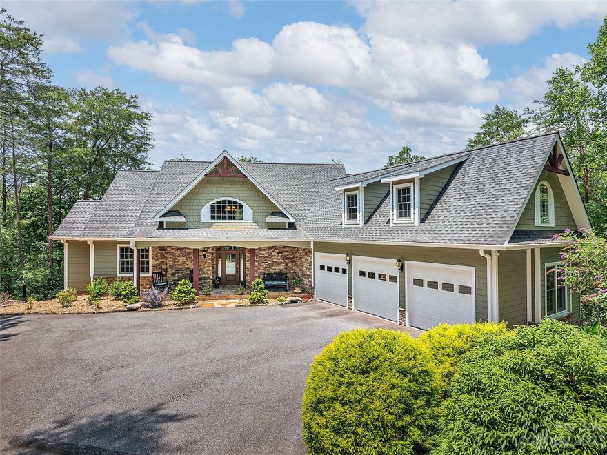 Nestled in the spectacular mountains of Western North Carolina, with sparkling lake water shimmering below, lies this majestic home that beckons for warm summer days and crisp, cool nights with family and friends. The long, private driveway will lead you to your perfect retreat. Just close your eyes and imagine the oasis of possibility that awaits you with the best of both worlds - mountain views and lakeside living. Spend your days exploring the water embarking from your private floating dock and personal alcove beach area, or cap off the evening with laughter and conversation around a mesmerizing fire. Enjoy the ease of entertaining indoors and outdoors with ample, comfortable living spaces throughout. When it’s time to turn in for the night, there is plenty of room to spread out, relax and dream about tomorrow’s adventures. This home is guaranteed to turn your dreams into a reality. Take advantage of this opportunity to live the life you choose!