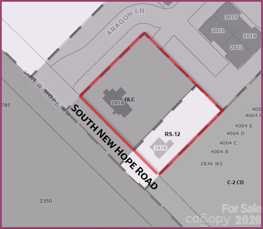 Commercial assemblage opportunity on S. New Hope Road. Two adjoining parcels totaling 0.96 acres are offered together to create a more functional redevelopment site with better frontage and access. The larger parcel is zoned OLC and includes an existing 1,900 SF structure in need of rehab; the smaller parcel is zoned RS-12 with a 1,000 SF residential home.  The combined site is very flat and build-ready, and the assemblage sits directly adjacent to a brand-new commercial retail strip center (not yet opened), demonstrating immediate commercial momentum along this corridor. While both structures have potential, the primary value is in the combined land and location. This stretch of S. New Hope Road is part of the planned NCDOT U-5821 N.C. 279 improvement project (Union New Hope Rd to Redbud Dr), expected to enhance roadway capacity and long-term visibility. Parcels will not be sold separately. Buyer to verify zoning, utilities, and allowable uses.