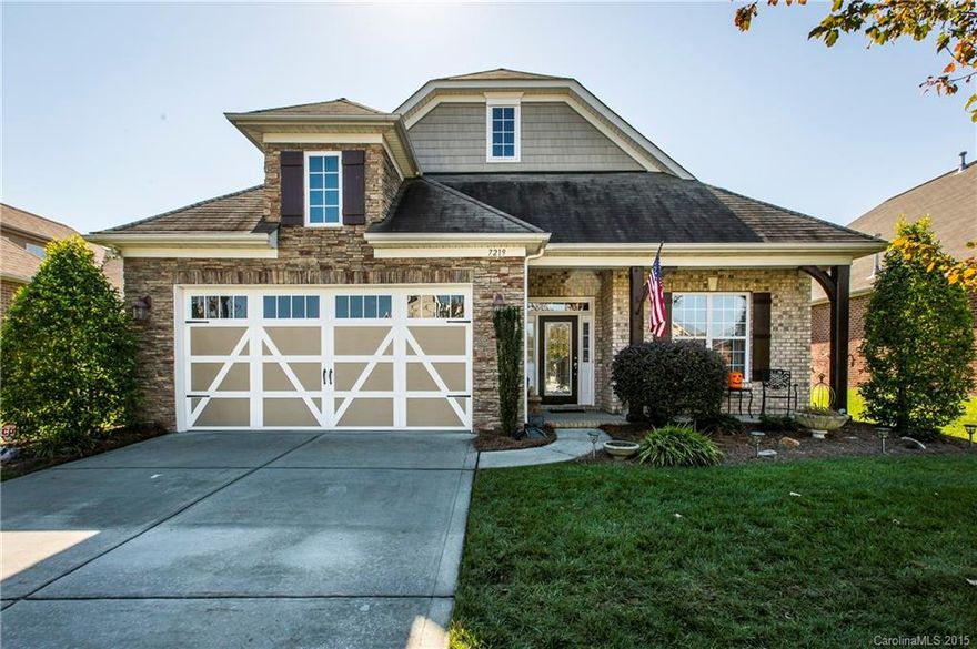 Full-brick & stone 2442 square foot newer ranch home with high ceilings in the exclusive Saddlebrook South section of Stone Creek Ranch. Gorgeous kitchen with large island, stainless steel appliances & granite countertops. Hardwood flooring in foyer, dining room, kitchen & breakfast. Extended sunroom overlooks fenced patio & lush backyard.  Vaulted ceiling & fireplace in great room. Dining room & master bedroom both have tray ceilings.  Double vanities in master bath.  Murphy bed in 3rd bedroom.