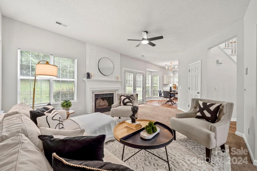 Seller has done the work! Come see this beautiful 4 bedroom, 2.5 bath home with recent updates in the highly desirable Bradfield Farms community.  You will be greeted by a beautiful 2 story foyer & stunning new lighting.  Enjoy cooking in the spacious kitchen updated with Quartz countertops, new LVP floors, new stove & microwave.    Primary garden tub, shower & sink professionally refinished & gleaming like new.  Foyer floor replaced with LVP. The painted brick and fiber cement exterior (installed in 2022 along w/new guarded gutters) make for a stately low maintenance exterior.  The backyard affords a fenced yard & shed.  Community includes 2 outdoor pools (home of the Barracuda Swim Team) tennis courts, playgrounds, & more. Sherman Branch Preserve is nearby for more outdoor fun.  Community is easily accessible w/close proximity to 485, Concord Mills, Motor Speedway, entertainment & diverse dining options. Refrigerator, washer and dryer to convey with acceptable offer.