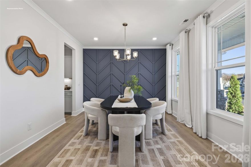 Come see 2050 Gallinule Drive located in Indian Trail, NC.

This exceptional home combines elegance, functionality, and modern design, offering a lavish living experience. The Hampshire offers 4 bedrooms, 3 bathrooms and a two-car garage. Step inside to discover an expansive living space that caters to the needs of modern living. The heart of this home is the gourmet kitchen, it features high-end stainless-steel appliances, elegant countertops, a center island, and abundant storage space. Escape to the primary suite, a spacious sanctuary completed with a comfortable bedroom area, en-suite bathroom and a seated shower, and dual vanity. It also includes a walk-in closet and a sitting room. In addition to the primary suite, the Hampshire offers multiple bedrooms, ensuring privacy and comfort for every member of the household. Flex rooms can be customized to fit your specific needs. With its impressive features and versatile living spaces this home is sure to exceed your expectations. Do not miss this opportunity to make this home yours.