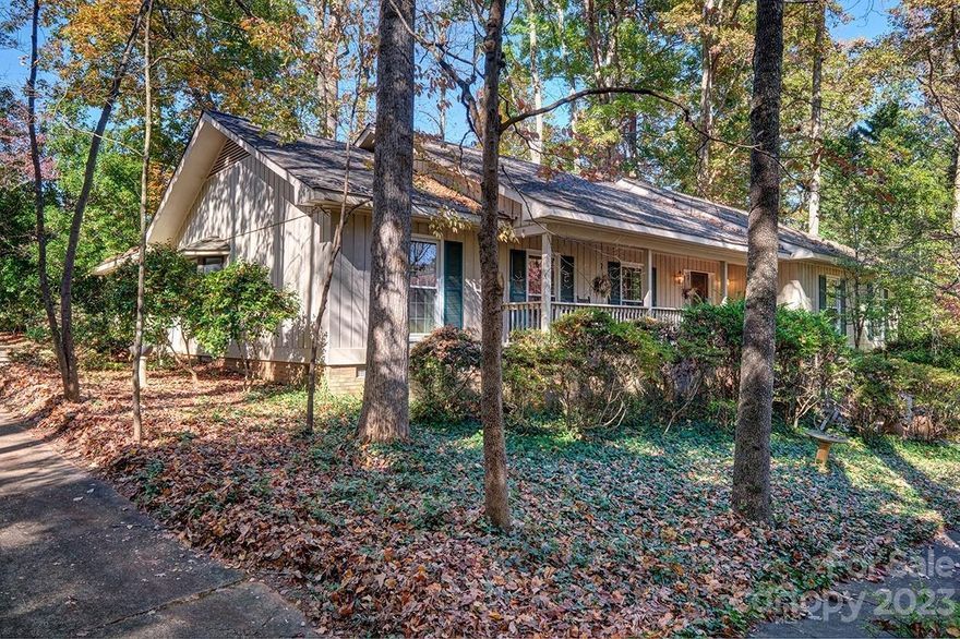 Move in ready RANCH in gated community of River Hills! All hardwood floors throughout entire home!Cozy den with wet bar that opens to 4 season room and also has large living room and formal dining room.  Covered front porch that is length of the house welcomes you to the front door.  Great privacy on a cul de sac within the neighborhood. Some updates have been done but you can make it your own. The bar opens to the kitchen so you don't miss the action. Nice primary suite and 2 other bedrooms round out the floorplan of this ranch. Oversized garage that also offers big workshop with built in work bench. Don't miss the walk in crawl space for additional storage and easy access to the mechanicals. Well cared for home.  Neighborhood offers miles of walking trails, waterfront park with sand beach and picnic pavilion, marina, country club with 18 hole golf course, 24 hour security ,gardens, dog park, playgrounds and more. All this and in the award winning Clover school district. Welcome home!