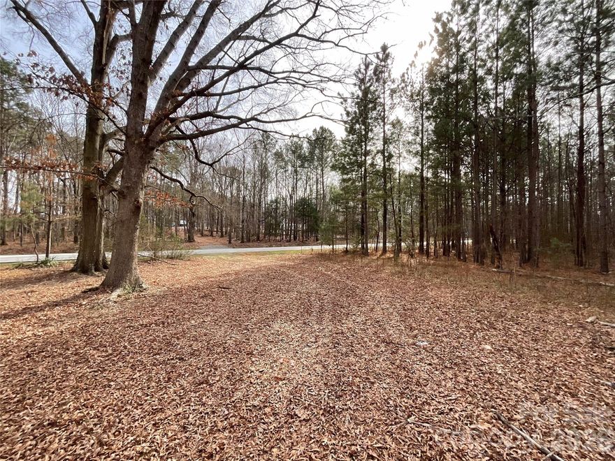Discover peaceful rural living on this exceptional 6.32-acre wooded lot in a pastoral county location. This private and serene property offers a lovely setting approved for a 3-BR custom home with enough room for agricultural and/or equestrian ventures. Conveniently situated just 10 minutes from Pageland, under 20 minutes to Monroe, and less than an hour to Charlotte via the bypass—ideal for those seeking country tranquility with easy access to urban amenities. This 6.32-acre parcel is available individually, or as part of a combined 13.32-acre offering with the adjoining Philadelphia Church Road property. A recorded easement for a septic repair field serves the adjoining 7-acre property (MLS 4342116), which is approved for a 4-bedroom home. Either one of the lots or the entire parcel is perfect for the buyer seeking space, seclusion, and opportunity in a bucolic rural location.