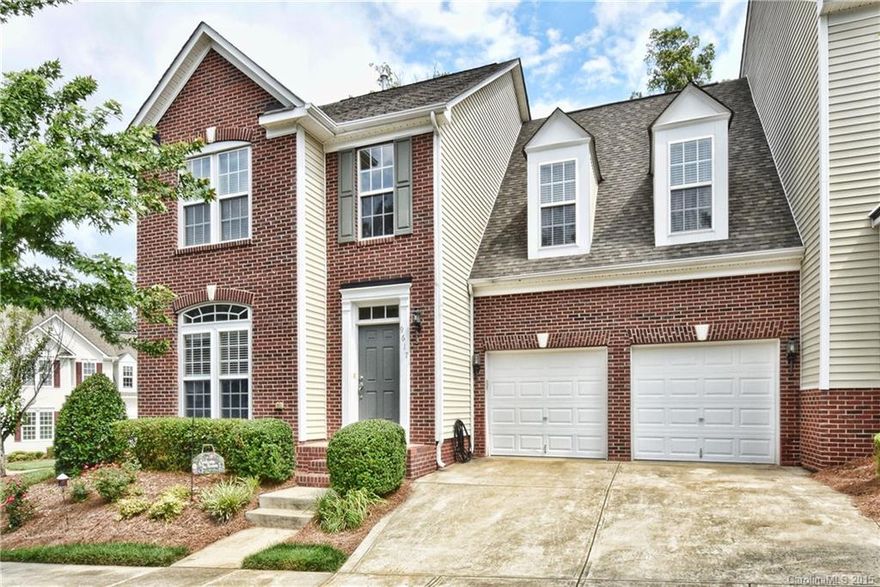 Fabulous Master Down End Unit with NEW Hardwood Floors! Enjoy low-maintenance living & phenomenal privacy. Spacious, open plan lives like a house. Large dining, gourmet kitchen w/granite, SS, dbl oven, butler's pantry, gas cooktop. 2-story Great room, Roomy master w/en-suite & walk-in closet. 2 big bedrooms up + loft perfect for office or workout space. The backyard is tree-lined & peaceful. Ideal for relaxing after a long day - with no yard work! Upgraded lighting, two car garage. Don't Miss!!