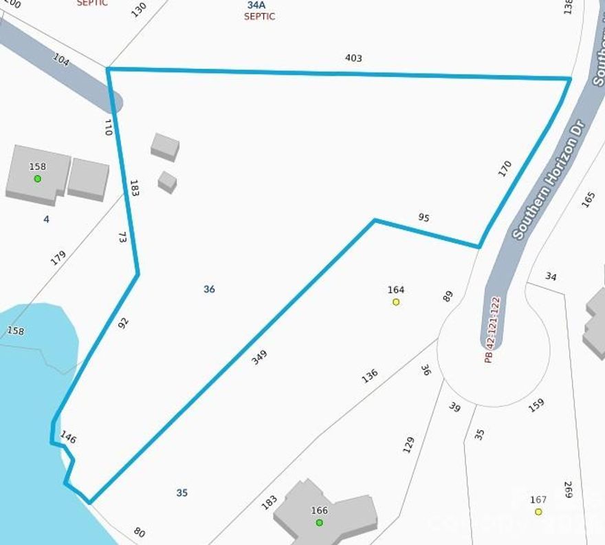 This wooded, sloping lot which is perfect for a walk-in crawl space or for a walkout basement leads you to a MAIN CHANNEL VIEW with 146 feet of water frontage; This lot is located on the right side of the road and just before the cul de sac; With no time frame to build, have your own builder build your dream home; The minimum sqft for your future home is 2,000; This lot is located just 10 minutes to a public boat launch;  Ridgewood is a smaller, quiet community with just a few roads and not even half of the lots have been built on; Enjoy Iredell County and its low property taxes; This property is close to the downtowns for Catawba, Claremont and Troutman; See the MLS attachments for information on the very minor encroachment by the property behind this lot;