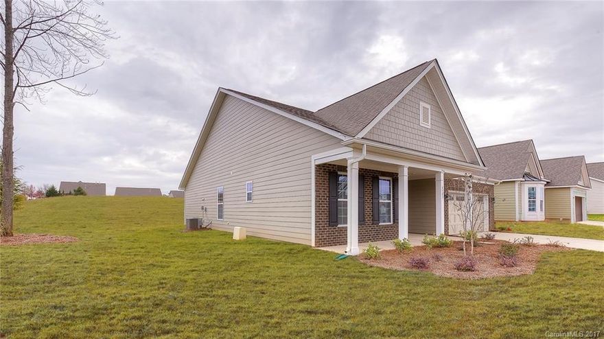 Fantastic open ranch floor plan with large kitchen family area.  Home is just 2 blocks from Lake Wylie waterfront trails and amenities.   Loaded with great details including granite counters in kitchen and all baths, extensive mouldings, hardwood and tile flooring.