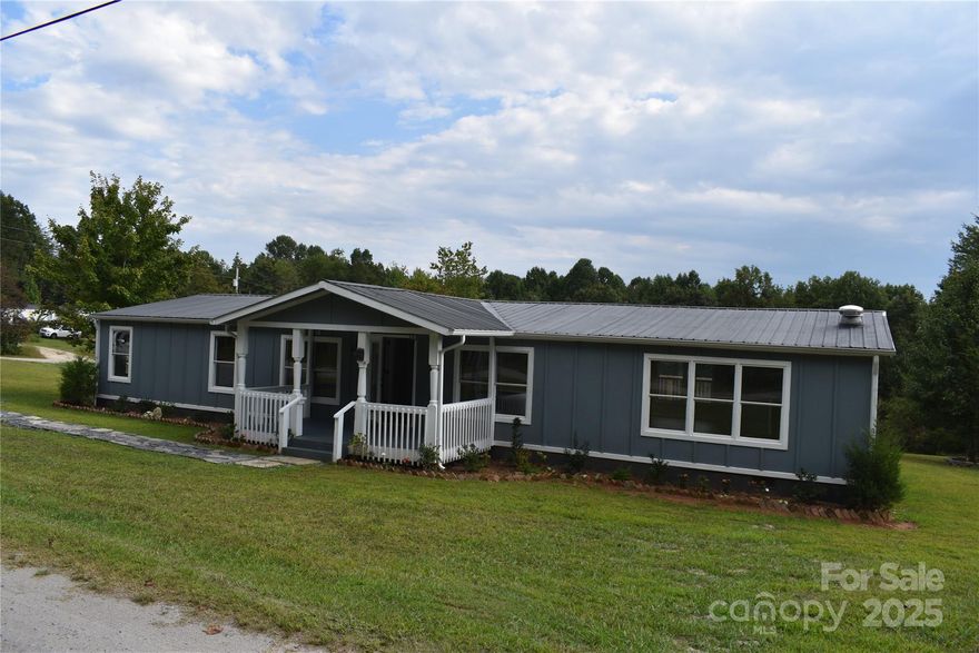 Updated 3 bedroom, 2 bath doublewide on Sweet Gum Drive off Deer Park.  This home has 1848 square feet and has been updated with fresh paint, laminate floors, new lighting, remodeled bathrooms, new kitchen cabinets, new appliances, & more.  Homes features on extra large living room with open floor plan, a formal dining room/office area and a large primary bedroom.  The primary bath has a new custom tile shower.  Outside you have a covered front porch in addition to a back deck overlooking your 1.53+/- acre level to gently sloping yard allowing room to grow, garden or what you can dream of.  You are convenient to I-40, Lake James, and just a short drive to Marion or Morganton.  Call to see this great home today!!!