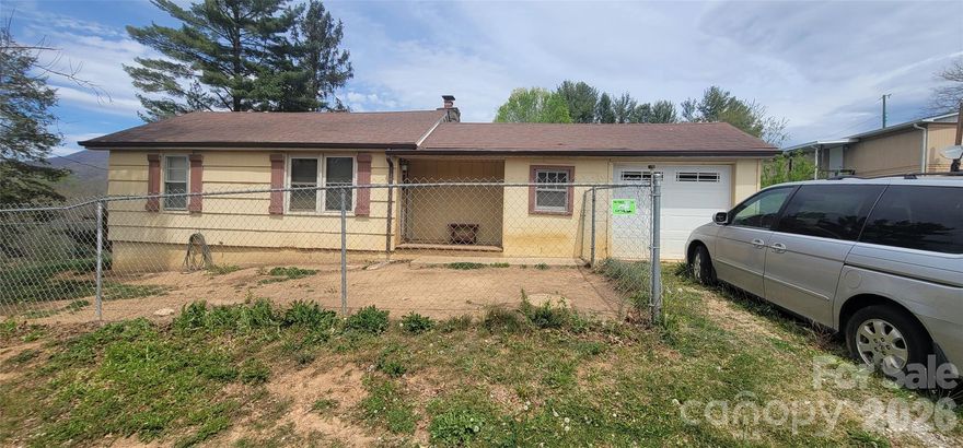 This ranch home offers a solid layout and plenty of potential for buyers looking to add their own style and updates. With a little cleaning and cosmetic improvements, this home can truly shine. The property also features a private backyard, providing a peaceful outdoor space for relaxing or entertaining. A great opportunity for homeowners or investors looking to personalize a home to their taste.