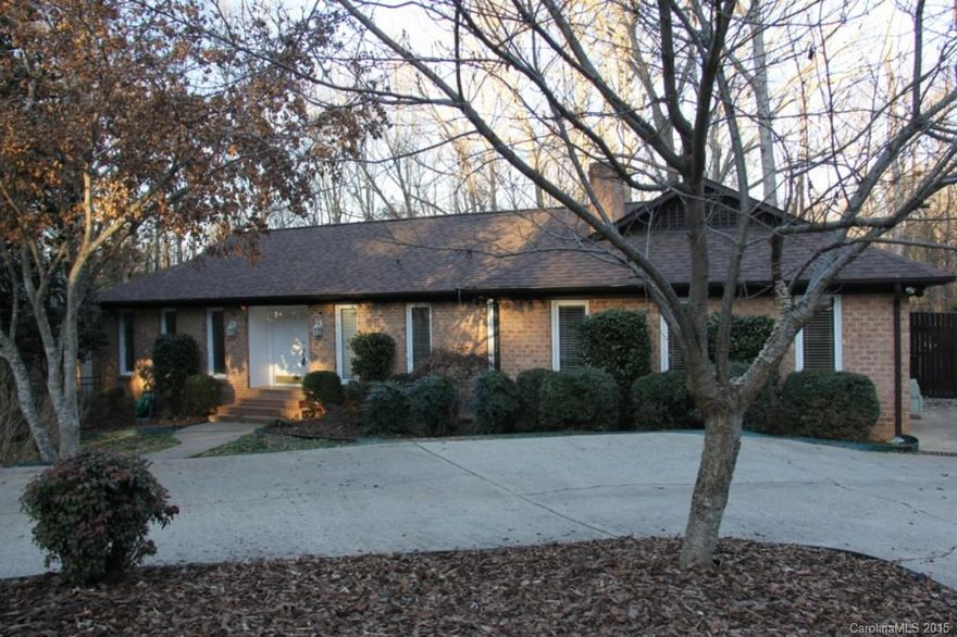 Hard to find prime location off Prov Rd. 2.4+/- acre wooded, fully fenced w/creek at rear. Brick home offers very livable floorpan w/entertaining areas on main level, ALL bedroom are in basement. Expansive deck on main & lower levels offers beautiful views of the lot & all the wildlife surrounding the home. Kitchen & baths have been updated. Property is nestled off quiet street, Providence HS, Providence Spring Elem. Easy to show.