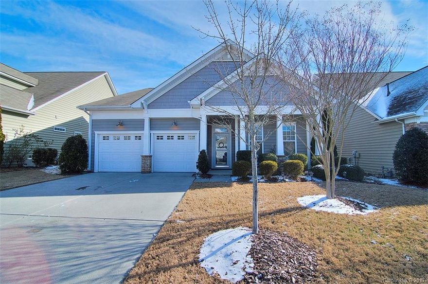 Gorgeous ranch with second floor bed/bonus. Tons of upgrades - crown molding, recessed lighting. Gleaming hardwood floors throughout main living area. Carpeted bedrooms. Open kitchen offers granite countertops, tile backsplash, cabinets w pull out drawers, dual ovens, & breakfast bar. Great room with gas fireplace. Spacious master with tray ceiling. Master bath with dual sinks, separate shower/tub & large walk in closet. Screened porch. Oversized patio w gas line to grill. Garage w utility sink.