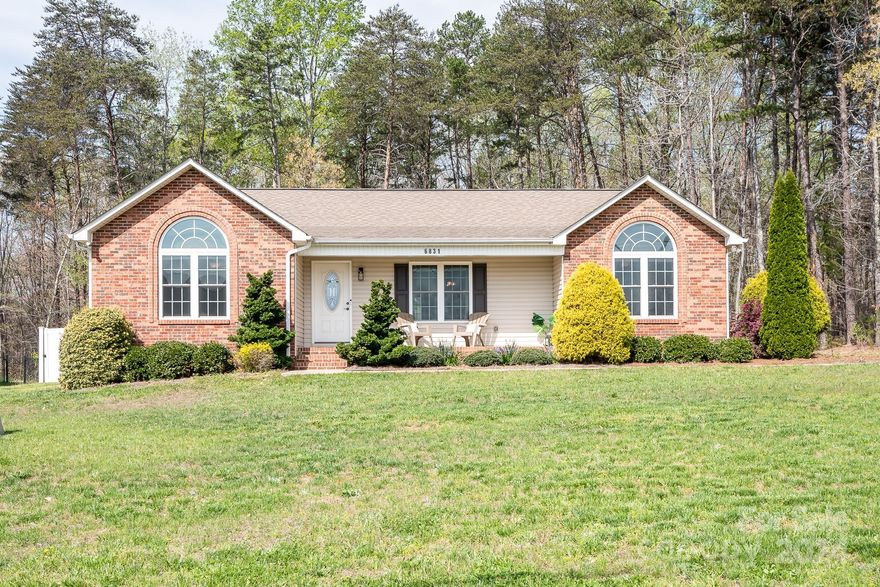 This beautiful ranch home with no HOA is situated on over an acre of land, and conveniently located minutes away from downtown Denver. Enjoy morning sun on the rocking chair front porch, and great light entering the vaulted living and primary bedroom. The split bedroom layout offers spacious rooms and dual closets in the primary. The kitchen has stainless appliances, water softener/purifier, plenty of cabinet and counter space, gorgeous upgraded marble countertops, brick backsplash, and new cabinet pulls.  This freshly painted home features true hardwoods in the main living spaces, tile bathrooms, 2 coat closets, spacious laundry room, and wifi ready security system.  Get ready to entertain in the fully fenced, sizeable backyard complete with fire pit, or enjoy quiet country living all to yourself.  In addition to the 2-car garage with key pad entry, there is ample parking for a boat, RV or guests.  Come see this beautiful slice of land and fantastically maintained house today!