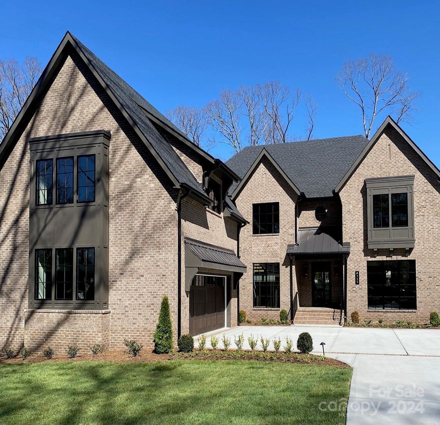 Experience modern luxury living at its finest with this stunning Cotswold new construction home by THR Design Build.  With its unparalleled craftsmanship and attention to detail, it features custom finishes and high end selections of lighting, fixtures, and appliances throughout. The spacious open floor plan provides a seamless flow between the living, dining, and kitchen areas, making it perfect for entertaining.  Open the accordion doors to the screened porch and extend the living space even further.  Main level primary bedroom is a true sanctuary with a spa-like bathroom and generous closet.  Upstairs you will find 4 additional bedrooms, laundry room, office, and large bonus room with wet bar.  Beautiful hardwood floors and large windows that provide an abundance of natural light are throughout the home.  Situated in a convenient in-town location close to Uptown, hospitals, dining, and shopping, this home provides easy access to everything the city has to offer.  Welcome Home!