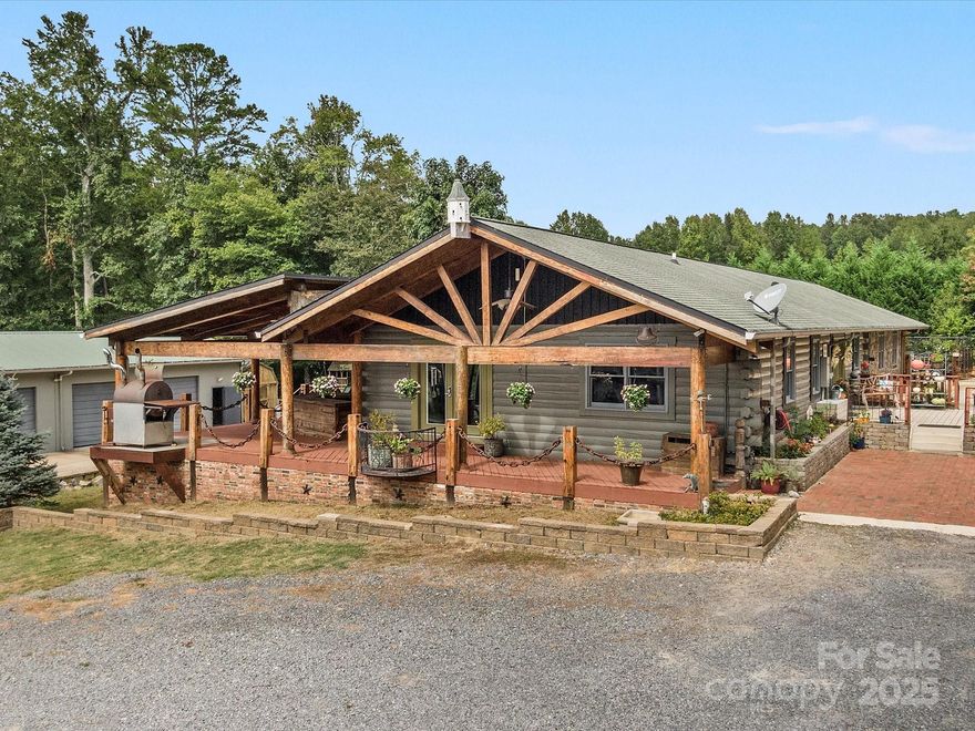 This is truly a unique and versatile property with income potential and multi-generational living. Situated on 4 acres with a prime location and easy access to amenities and major transportation routes.  Whether you are looking to live here, set up a small business approved by the county, or both,  this home would be ideal. The main house is well maintained that exudes charm, character with vintage woods & bricks on floors, walls & ceilings throughout. 2 large primary suites with sitting areas both include their own en-suite, 1 guest bedroom, 3 full baths with custom tiled showers, a reading/office space & gorgeously designed kitchen/ living area and 2 wood stoves. Walk-in pantry, huge laundry room with storage. This is a multi-use property with options to live and work with also the possibility of having a small farm if one so desired. Beyond the home, this property also offers a small pond, a large 2,187 sf 4 bay garage/workshop with 2 locking rooms, 1625 sf RV storage with 2,000 sf lean to , climate controlled barn with storage & individual rooms for various purposes/workshop/home office/ classrooms, etc. In the barn you will find a partially finished 1 bedroom 1 bath apartment waiting for your personal touch to be completed. The seller's unique vision took a 1963 Chesee caboose and converted it into a custom tiny house that includes a kitchenette, full bath with custom shower & sitting/sleeping room and a deck for relaxing outdoors. Also included is another separate tiny house that would be ideal for guests, or potential rental income. Surrounded by large mature trees, this incredible property is very private. The entire property is fully fenced in with multiple entrances. You have many options to let your imagination run free with this property. This property will not disappoint. If you are looking for a multi-use property, income potential, and multi-generational living, this is the one for you! TRULY A MUST SEE TO APPRECIATE! Schedule your private tour today.