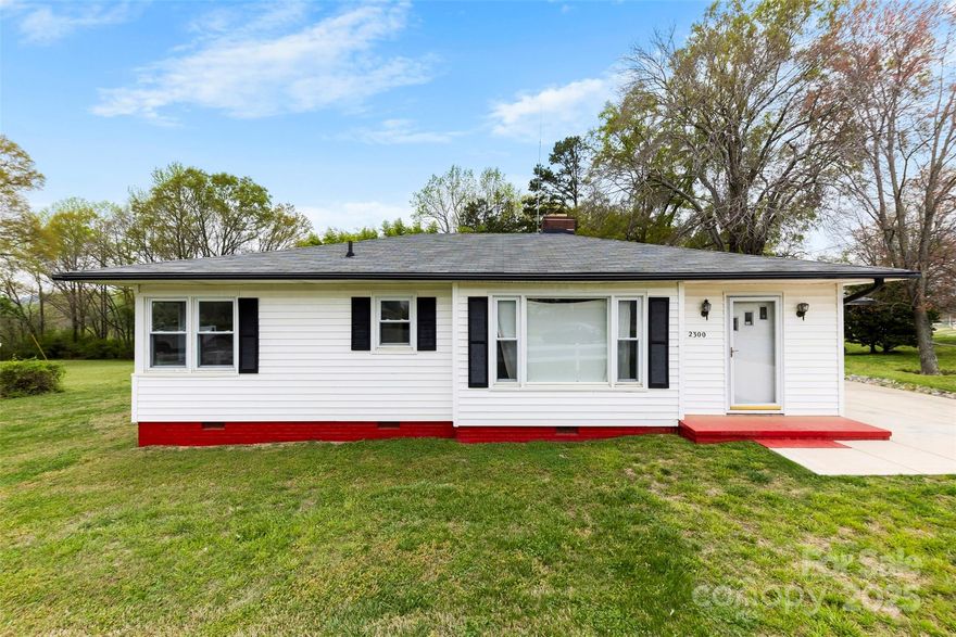 REDUCED FOR A QUICK SALE.Discover this beautifully well kept 3-bedroom, 1-bath home in West Gastonia, perfectly situated near grocery stores, restaurants, and the popular Crowders Mountain. A dream location for commuters heading west, this home offers both convenience and comfort. Recently painted and featuring hardwood floors and updated windows, along with a 5 year old roof and 5 year old gaspack for HVAC, this home is pretty much move-in ready but could also use your personal touch for other minor cosmetic updates! Don’t miss your chance to own a charming property in a sought-after area and the potential to later become commercial on this corner lot with commercial already across the street! You will not find a better home at this price, guaranteed.