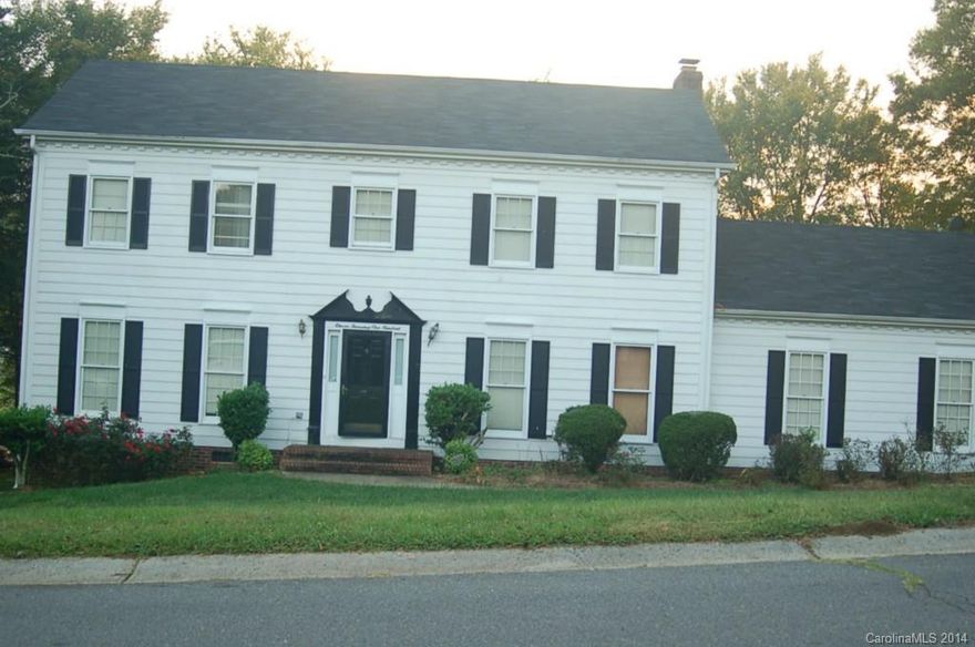 Very spacious and Grand two story home with a lot of space to grow. Step into the formal foyer which leads to the formal living room and formal dining room.  The eat in kitchen is open to the family room, which features a wood burning fireplace. The laundry room is just that-A room! And, it leads to the oversize two car garage.  The master bedroom has a separate garden tub and shower and an adjoining room to make a master suite or another bedroom.  Although nice and spacious, some TLC is needed.