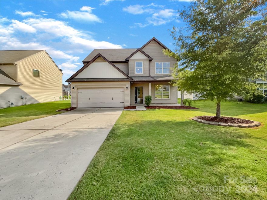 Seller may consider buyer concessions if made in an offer. Welcome to your dream home! Step inside this picturesque property and be greeted by a cozy fireplace that provides warmth and a welcoming ambiance. Surrounding you is a sophisticated neutral color paint scheme that lends itself to an air of calmness and serenity, perfect for those yearning for a calming living environment. The primary bathroom serves as an oasis, featuring double sinks that provide plenty of room and storage for a clutter-free lifestyle. The kitchen, the heart of this home, is equipped with all stainless steel appliances. High-end features and finishes, paired with an accent backsplash, add character and a touch of elegance to the space. The seamless flow to the inviting outdoor patio area enables effortless entertaining or simple relaxation amid the serene surroundings. End your day by retreating to this house, which combines functional living with exquisite design. This property won't just be a house, but you