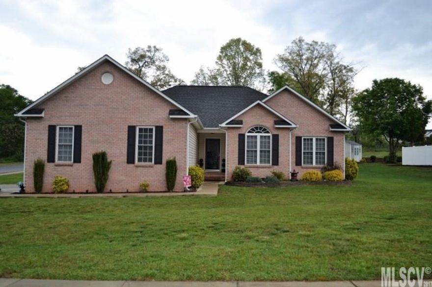 Immaculate one-level home in move-in condition on large, level corner lot.  Covered entry way opens into a great room with cathedral ceiling, beautiful hardwood floors, and gas log fireplace.  The great room flows into adjoining dining room which then opens onto covered side porch.  Very nice master suite with large walk-in closet, master bath has dual vanities, separate shower and jetted tub.  Two-car garage with workshop area and pull-down attic access with floored storage.  Hot tub on patio.