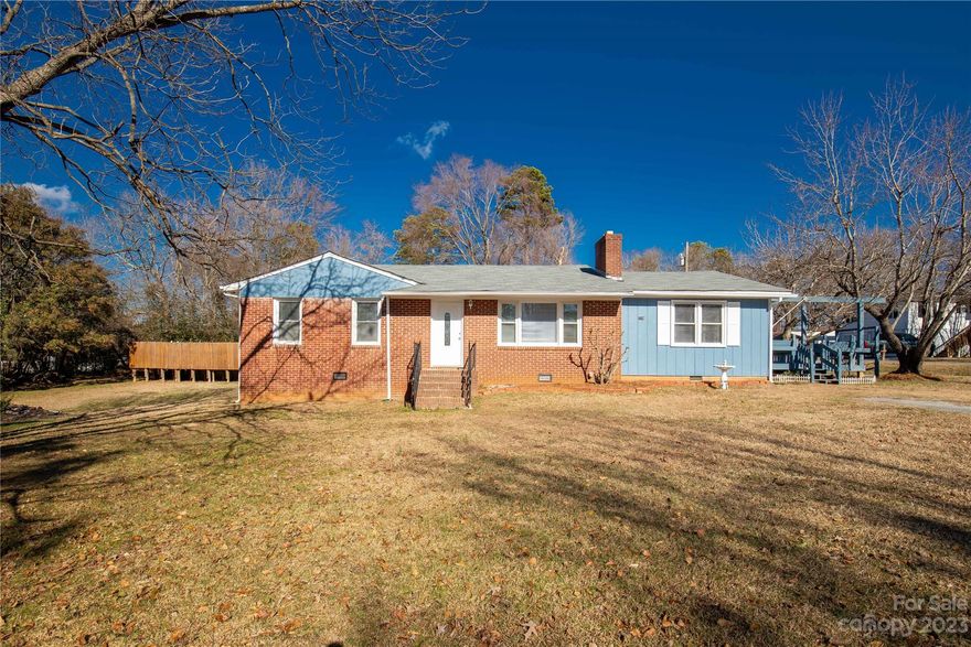 Sweet location! Sweet renovations! Sweet home! This charming three bedroom, one bathroom home sits just minutes from the heart of Fort Mill.  Large family room/dining area with functioning wood burning stove. Fresh paint throughout, newer appliances, and kitchen flooring. Roof was re-shingled in the fall of 2023.  Home is on a private well and septic.