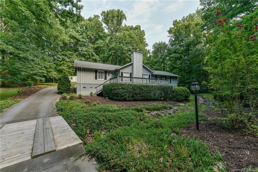 Gorgeous home tucked away but so close to everything.  You must see the beautiful setting this home is in.  Very private, split, open floor plan perfect for entertaining.  So much storage including two walk in pantries.  Finished playroom in basement.  Wired workshop in back.  This home has too much to list - you wont be disappointed.