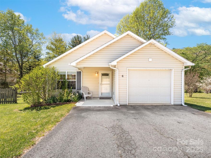Tucked away in the serene hills, this home offers the perfect blend of privacy and convenience. This lovingly maintained home sits on a gentle half-acre lot surrounded by nature—offering the kind of peace and quiet that’s hard to come by. Inside, you’ll find a light-filled layout with an open living and dining area, hardwood floors, and a cozy atmosphere that feels like home the moment you go in. The kitchen is functional and welcoming, with ample counter space and easy flow into the living area-perfect for everyday living or hosting guests. Outside the home is the screened-in back porch, your personal oasis for morning coffee, evening wind-downs, or simply enjoying the sounds of the mountains. There's also room for gardening, outdoor play, or evenings around the fire pit. Additional highlights, easy access to I-40 for commuting or weekend adventures, and proximity to local favorites like the Blue ridge Parkway. This home is a rare find, move-in ready and full of charm.
