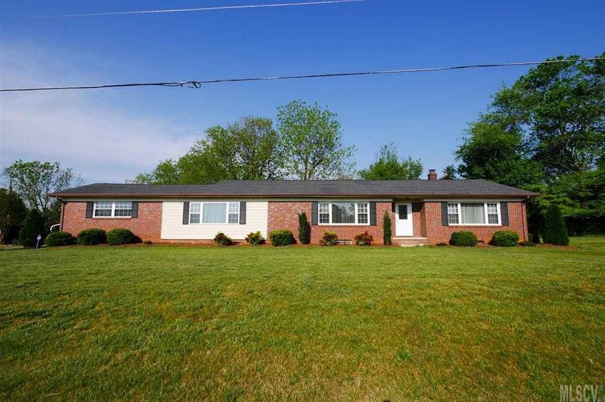 Brick 4 bedroom ranch home with many updates since 2009. Updates include new electric garage door, new windows, new kitchen cabinets, countertops and tile flooring, kitchen appliances, remodeled bathrooms with tile work and tile flooring, refinished original wood flooring. This home has an enclosed breezeway between the garage and the house. All bedrooms are large rooms. Security system installed, full unfinished basement for storage and over 1.5 acre lot.