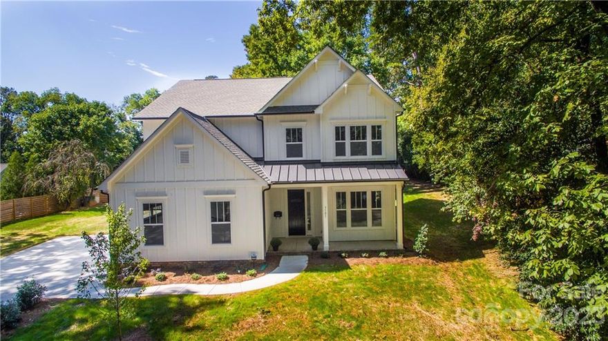 Luxury home in the coveted Plaza Midwood area within walking distance to Charlotte Country Club! Situated on a large, .42 acre, tree-lined lot on a quiet street. Pull Inside your 3 CAR SIDE-LOADED GARAGE in Plaza Midwood!! This new 5 bedroom, 4 bathroom spacious home features 10 ft ceilings on the main and 9 ft ceilings on the upper with great flow. Main level features an open floor plan with dining, kitchen, great room, pantry, drop zone, study, full bathroom, and guest bedroom. Second floor features large master suite with spa-like bath with frameless shower, remaining bedrooms, large bonus room and laundry. High-end kitchen with quartz countertops opens up to the great room and dining room, perfect for entertaining. Continue through the 4-panel sliding doors to the beautiful 0.42 acre lot with screen porch and large patio. Natural light floods through all of the house.