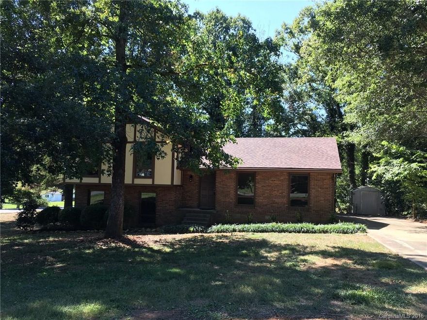 Totally updated home under $200k in Fort Mill! New paint, new carpet, new bamboo flooring, cabinets, granite, etc! Move in ready and 4 large bedrooms! Gorgeous bathrooms. Large lot with massive trees, deck, patio and storage building.